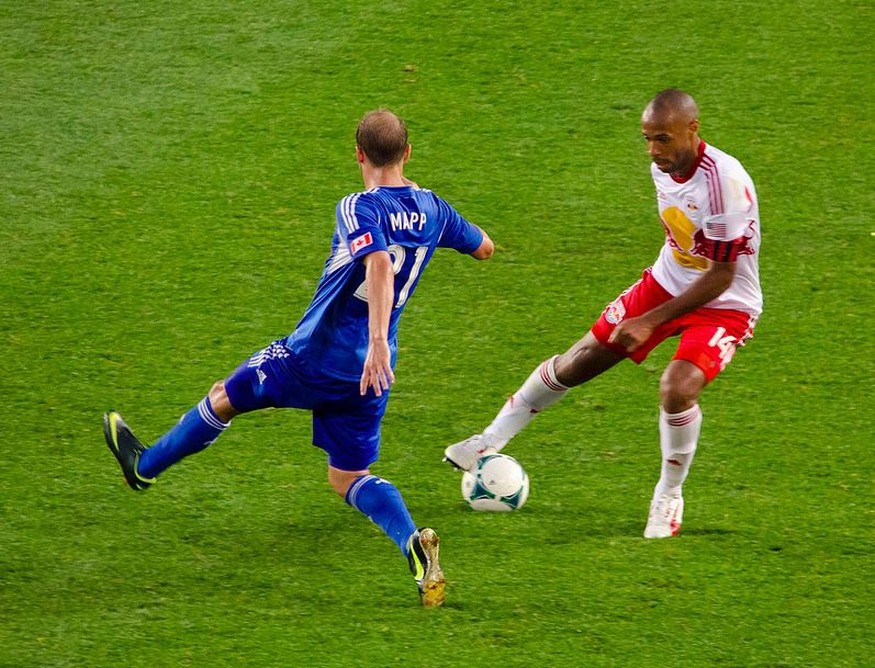 Thierry Henry shows Justin Mapp his ball control.